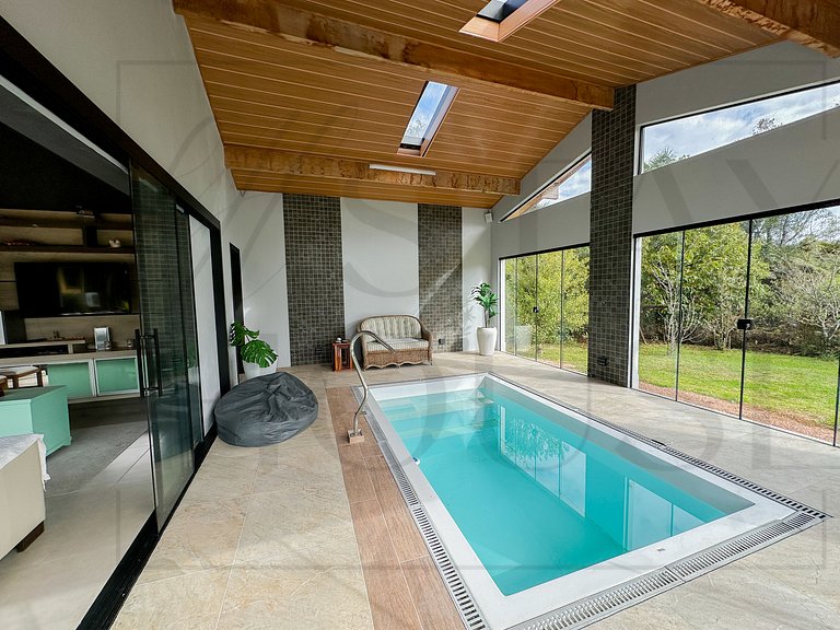 Casa com piscina em Canela